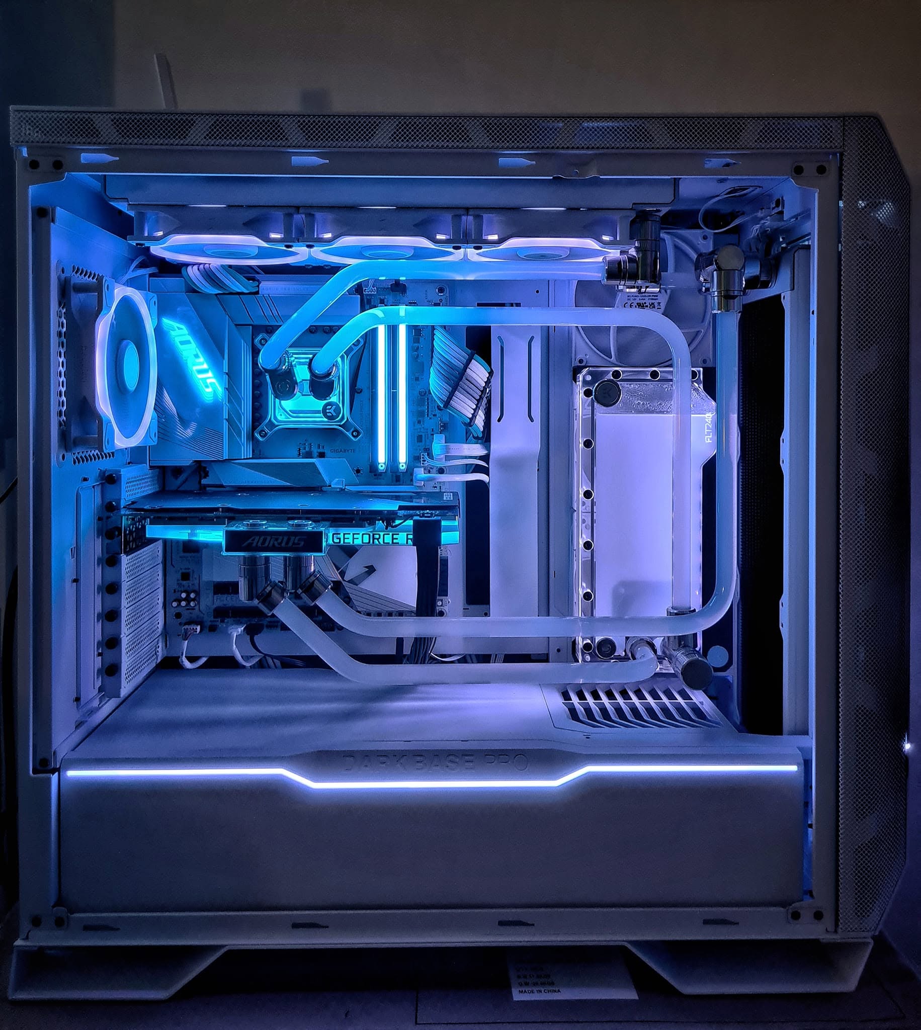 Close-up of the tubes and blue-lit cooling loop in a KCFPS build